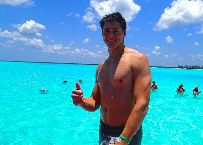 Jason in the blue and shallow waters of Cozumel island.