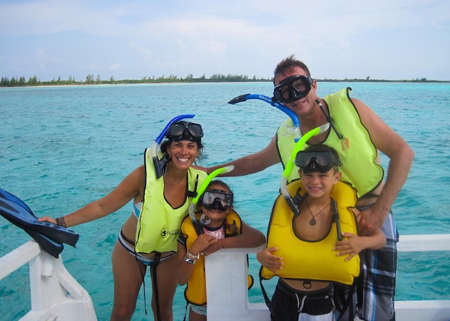 A family enjoying their private van tour in Cozumel.