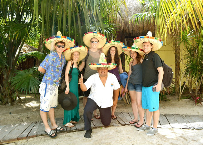 Shawn and friends drinking tequila during a fun day on the island.