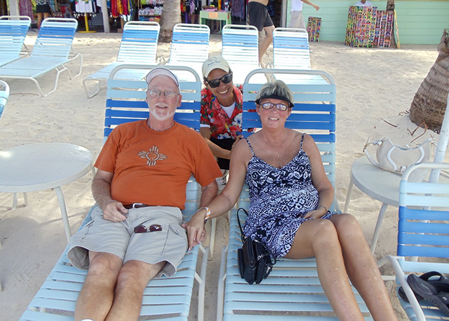Allene and her husband enjoying a fresh beer after an adventurous day on the island.