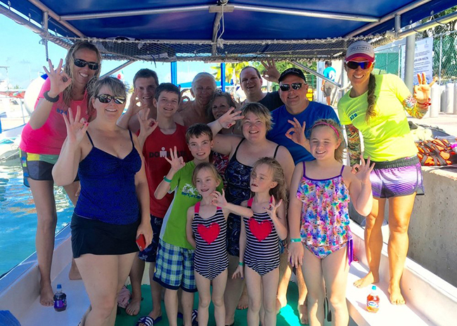 Barbara having a good time with her family on a Cozumel van tour.