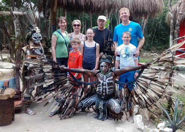 Joe and kids very excited enjoying a mexican cultural show.